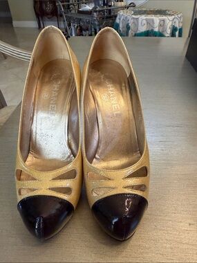 CHANEL Gold and Black Two-Tone Peep-Toe Pumps